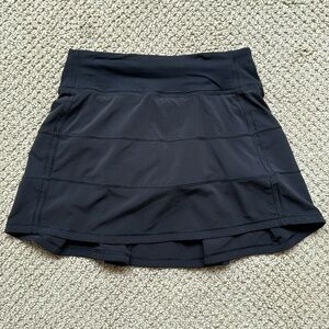 Black Lululemon “Pace Rival” skirt - mid rise - built in shorts